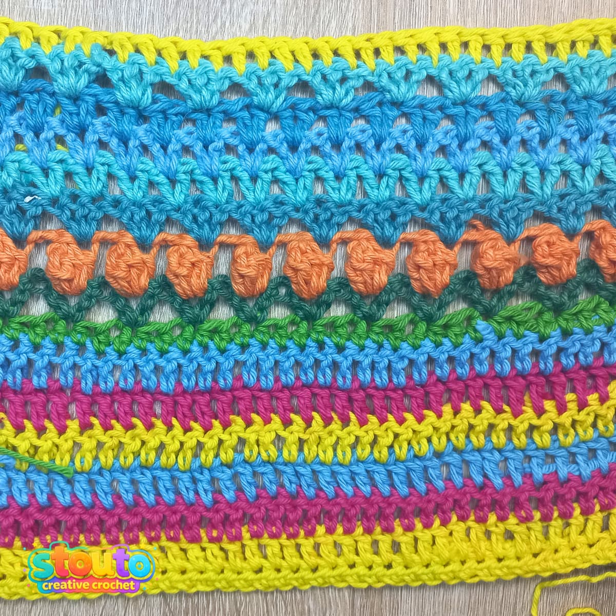 Ultimate Stitch Sampler Blanket photo guide for Rows 0–15. Learn foundation chains, stitch counts, colour changes and crochet techniques.
