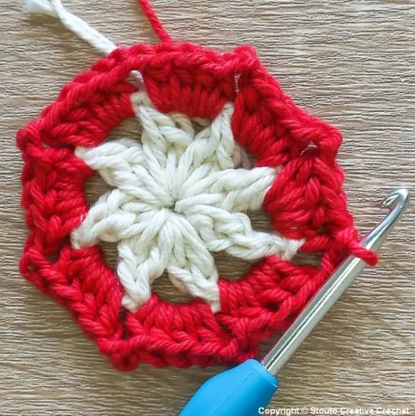 Round 2 of African flower crochet square forming the first petal layer