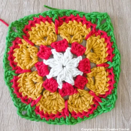 Round 6 of African flower crochet square adding texture and structure
