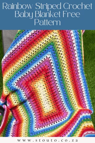 Soft rainbow striped crochet baby blanket with clean stripe pattern