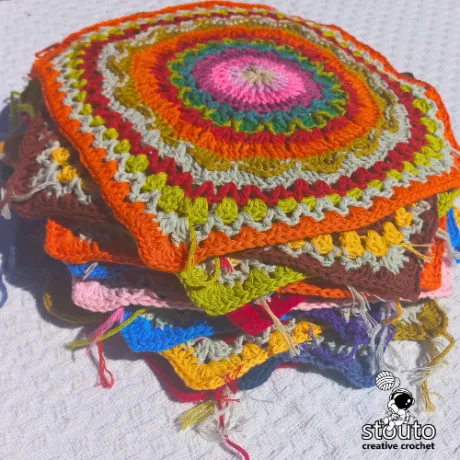 Ensure you use the same yarn weight and hook for all squares so they match in size.