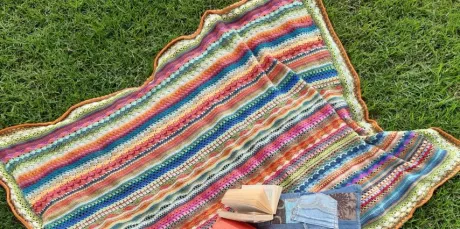 Cplorful lines and textures in easy crochet stitch sampler blanket