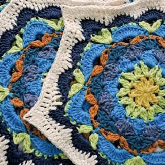 Hexagon flower centered crochet square