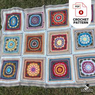Handmade modern granny square blanket pattern with floral squares