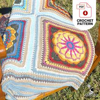 Close up of flower granny square crochet motif texture and stitches