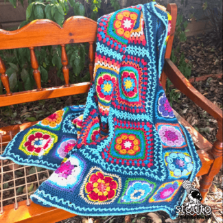 African flowers squares crochet blanket with colorful floral motifs