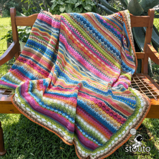 Beginner-friendly crochet stitch sampler blanket project in progress
