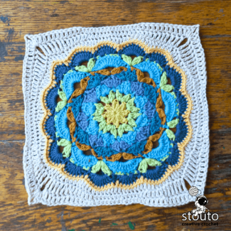 Blue flower granny square inspired by Forget Me Not blooms