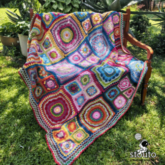 Crochet flower blanket made from African inspired floral motifs