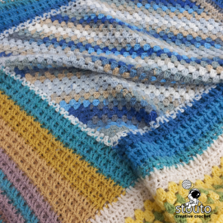 July Blues waffle stitch crochet blanket pattern free online pattern. 