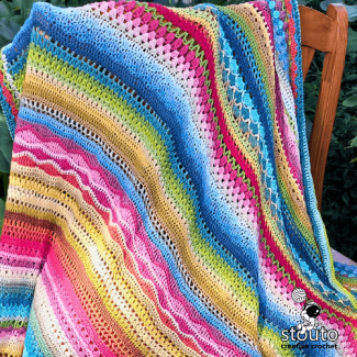 Crochet sampler blanket showcasing different stitch textures