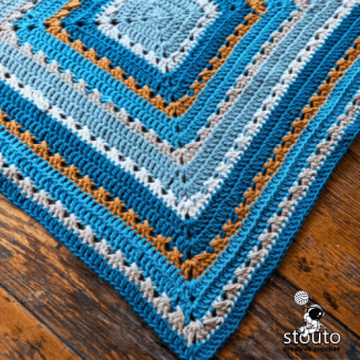 Beginner-friendly crochet blanket pattern, expanding square design