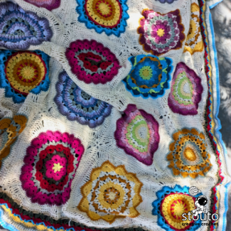 Flower granny squares blanket layout showing joined crochet squares