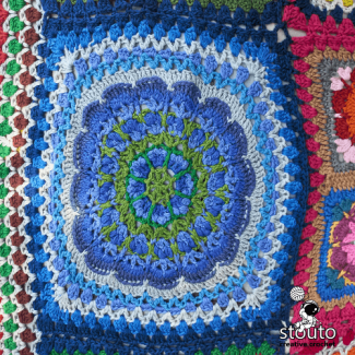 African flower granny square sample pattern 3 worked in bold colors