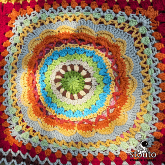 African flower granny square in bold colour combination for patchwork blanket