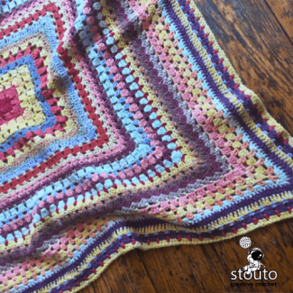 Mixed stitch scrap yarn baby blanket crochet pattern with textured rounds