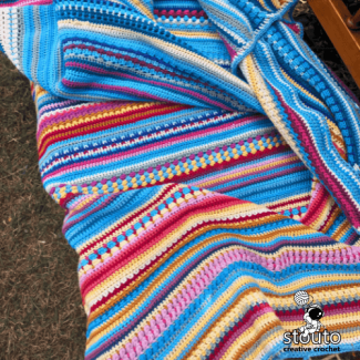 Mixed stitch temperature blanket design with varied crochet textures