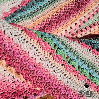 Vintage florals crochet blanket design inspired by a blooming spring rose garden