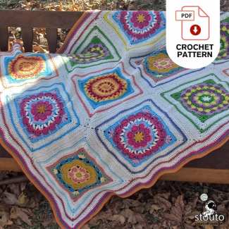 Textured large granny square crochet pattern with layered flower centre