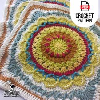 Large granny square motif ideal for patchwork blanket projects.