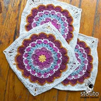 Early Blossom crochet flower granny square pattern featuring a large floral afghan square worked in the round.