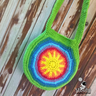 Sunshine Rainbow Round Crochet Bag finished front view with colourful sun motif  