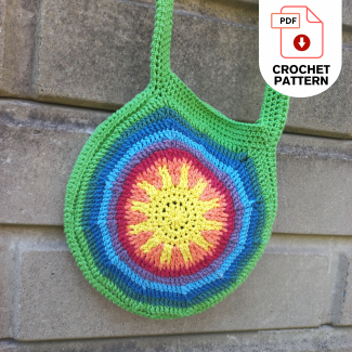 Textured round crochet handbag made using front post double crochet stitches