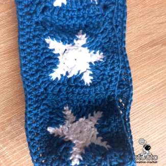 Join small crochet stars sqaures together
