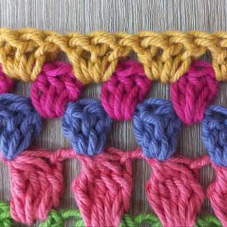 Rows 57 and 58 reminder: Work into the space between the 3-dc stitches,
