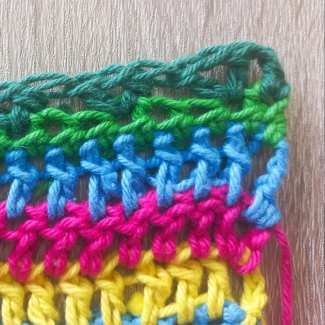 Row 8 – Skipped Stitches and V-Stitches