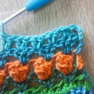 Row 11 – Working Two Double Crochet Stitches into a Space