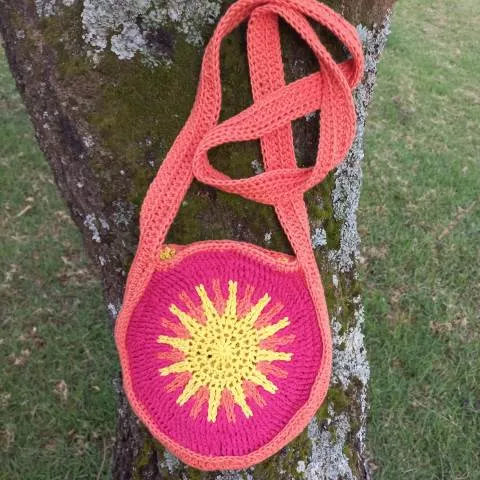 Pink yellow and orange african sun crochet bag