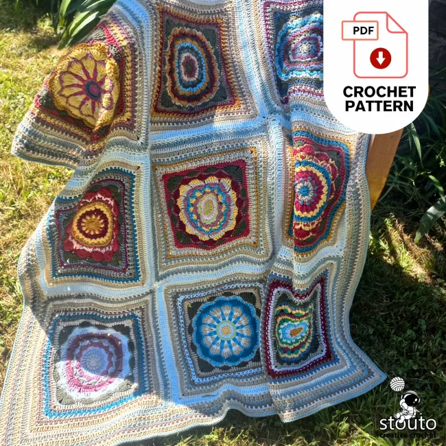 Flat lay of crochet granny square blanket pattern in progress