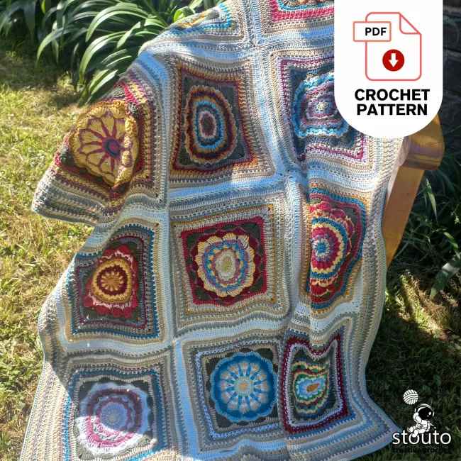 Handmade modern granny square blanket pattern with floral squares