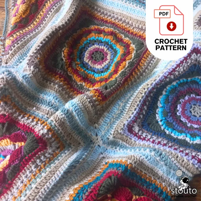 Crochet granny square blanket pattern with floral heirloom design
