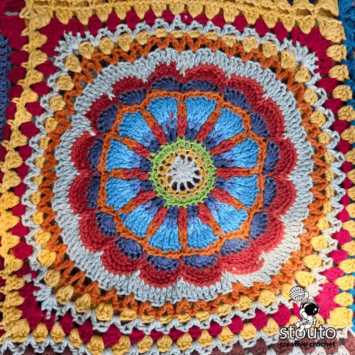 African Flowers Patchwork Afghan layout showing large and small flower squares joined