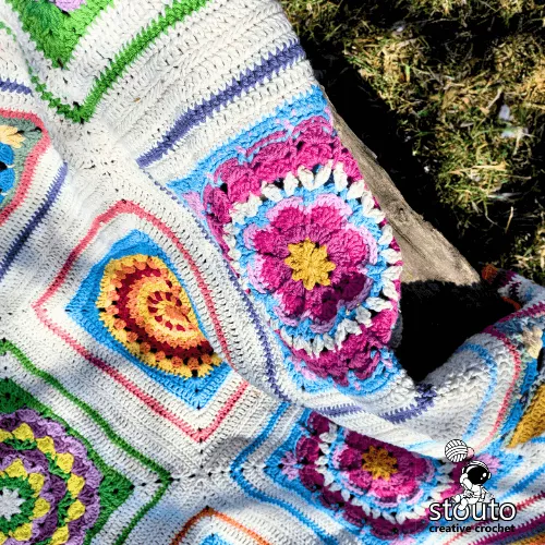 Boxed Flower blanket made with big granny squares
