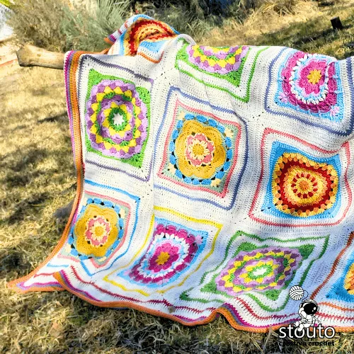 Boxed Flower blanket made with big granny squares