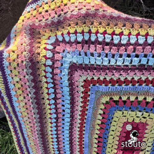Fast crochet baby blanket pattern perfect for using yarn scraps and leftovers