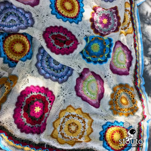 Flower granny squares blanket layout showing joined crochet squares