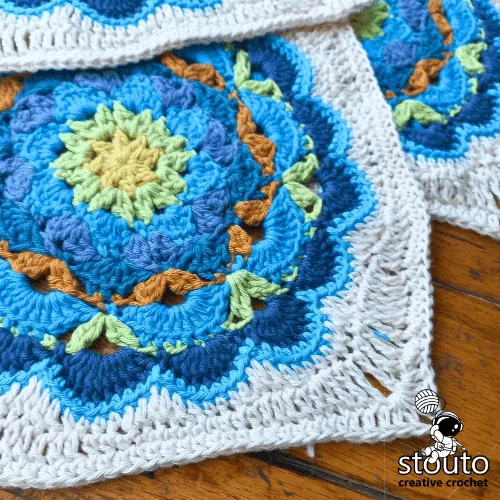 Forget Me Not flowers crocheted into granny squares