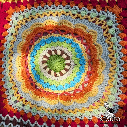 African flower granny square in bold colour combination for patchwork blanket