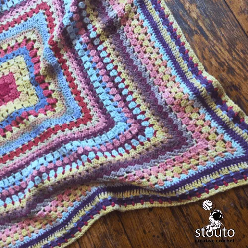 Mixed stitch scrap yarn baby blanket crochet pattern with textured rounds