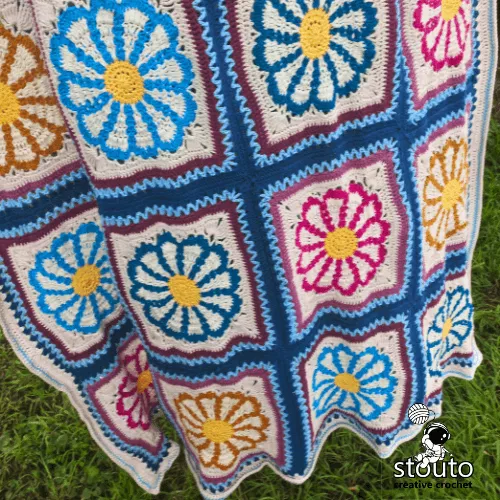 Modern floral granny square blanket with fresh spring color palette