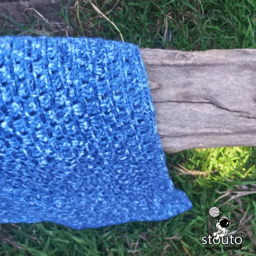 Quick crochet baby blanket made with four skeins of yarn