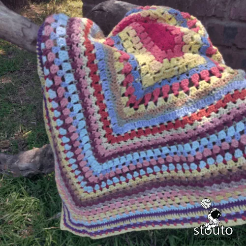 Small yarn crochet project baby blanket ideal for leftover yarn and stash busting