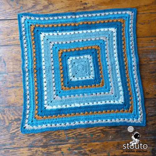 Blanket made using extra large textured afghan squares 