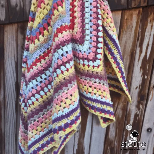 Textured scrap yarn crochet baby afghan worked in the round