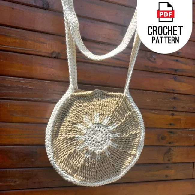 Handmade round crochet bag for summer and beach outingsClose-up detail of textured sunburst crochet bag stitches