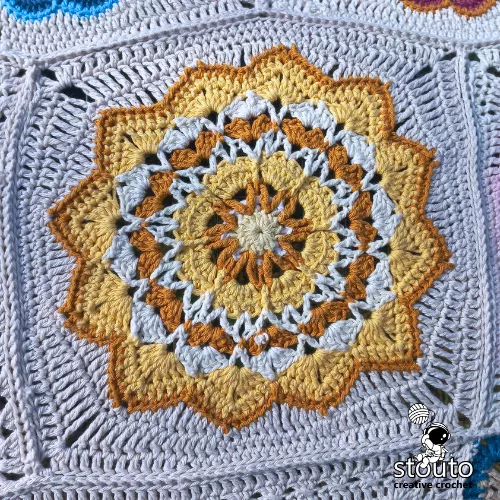Crochet flower square close-up from the patchwork blanket design